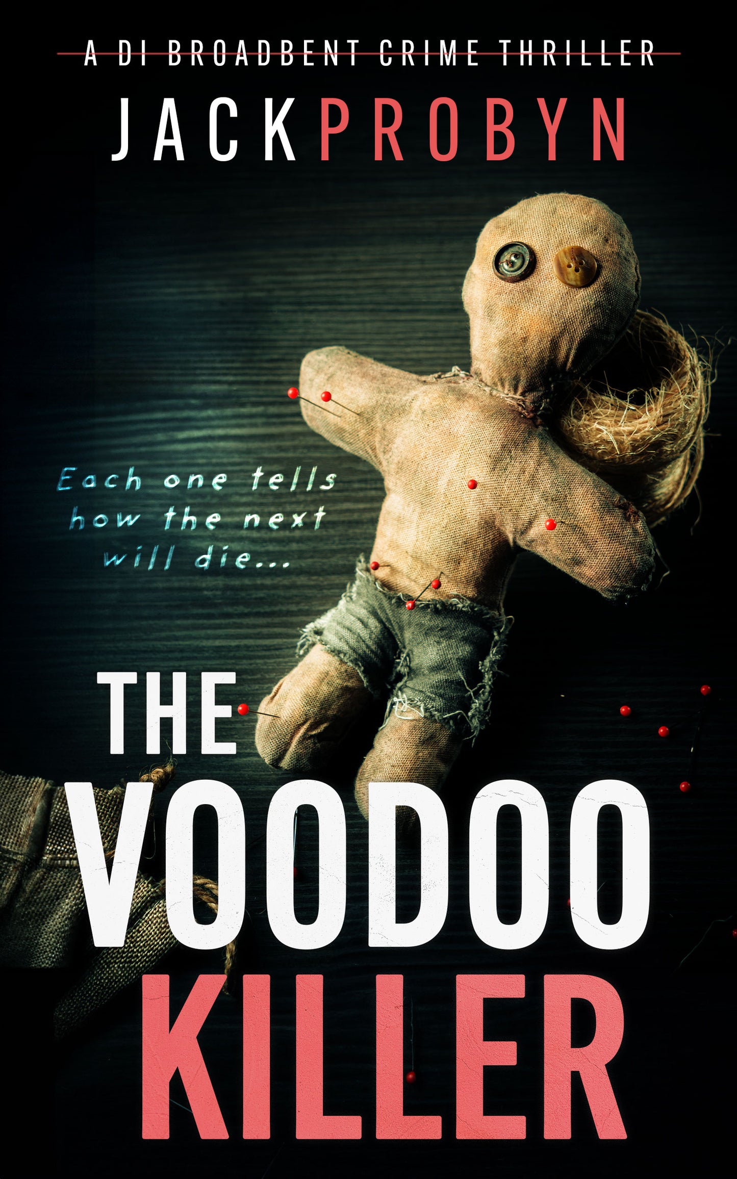 Book cover for The Voodoo Killer, a DI Broadbent crime thriller by Jack Probyn. The image features a weathered, hand-stitched voodoo doll with button eyes and red-tipped pins stuck into its limbs against a dark, textured background